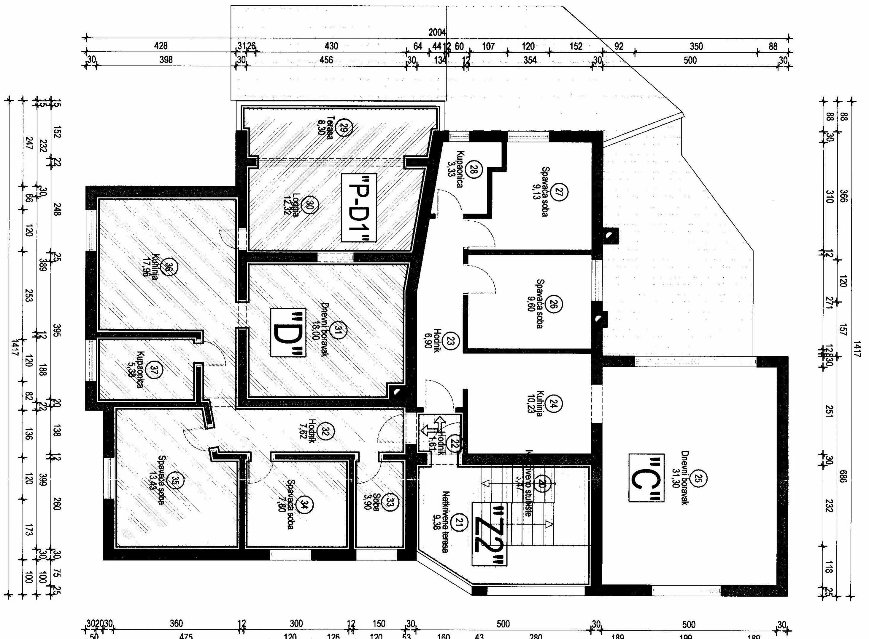 Un plano de planta que muestra varias habitaciones, incluyendo una amplia sala de estar central, varios dormitorios y una cocina.