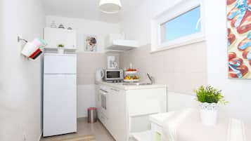 Căn hộ, 2 phòng ngủ, hiên, quang cảnh biển | Bếp riêng | Tủ lạnh, lò vi sóng, lò nướng, bếp nấu