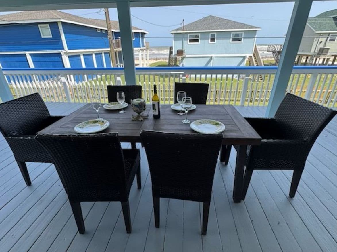 Steps away from the beach! Large covered deck, great for relaxing in a.m or p.m.