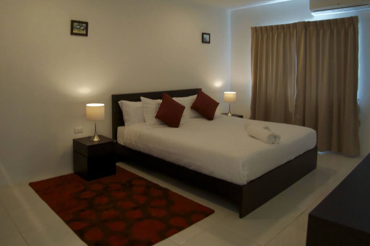 One Bedroom | 1 bedroom, desk, blackout curtains, cots/infant beds