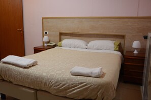 Quarto casal | 1 quarto, Wi-Fi de cortesia, roupa de cama