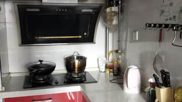 Two-Bedroom Apartment | Private kitchen | Fridge, microwave, stovetop, electric kettle