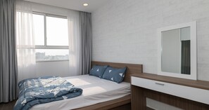 Apartemen, 2 kamar tidur | 2 kamar tidur, meja kerja, dan Wi-Fi gratis