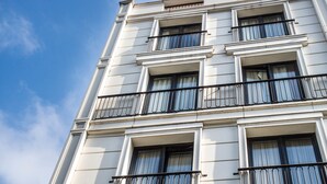 A multi-story building with balconies and large windows. - The White Orient Hotel (Istanbul)