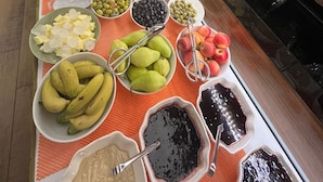 A buffet with various food items and condiments. - The White Orient Hotel (Istanbul)