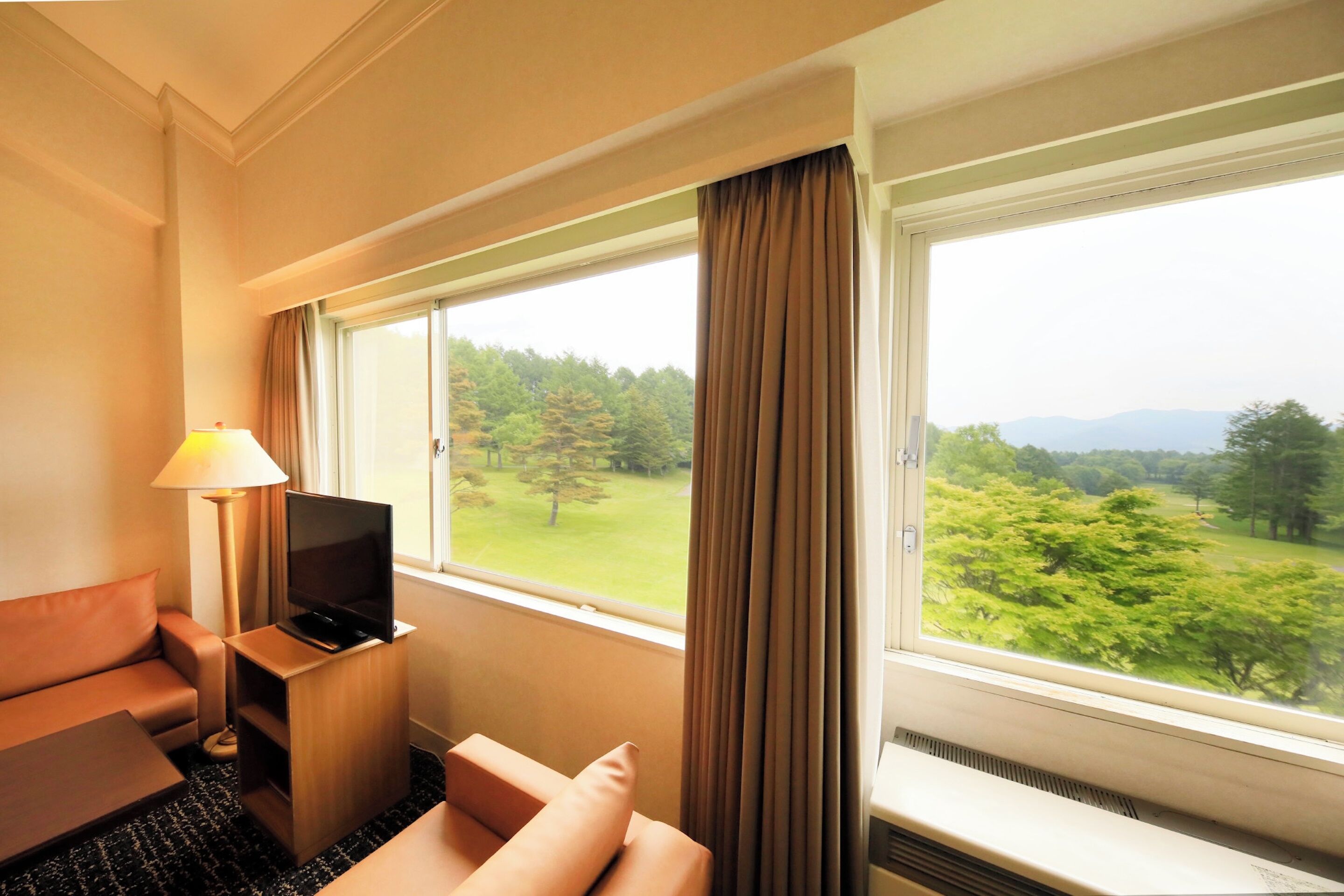 family quadruple room, 4 bedrooms | living area | lcd tv