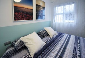 2 habitaciones, tabla de planchar con plancha, wifi y ropa de cama 