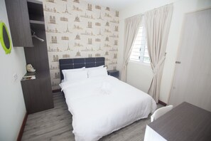 Queen Room, Shared Bathroom | Desk, laptop workspace, blackout drapes, iron/ironing board - Natol Homestay - Paris BDC (Kuching)