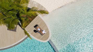 Outdoor pool, open 7 AM to 9 PM, pool cabanas (surcharge), pool loungers