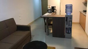 Condo Unit for 4 Pax | Living area | TV, Netflix