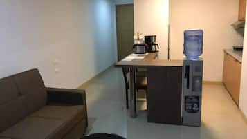 Condo Unit for 4 Pax | Living area | TV, Netflix