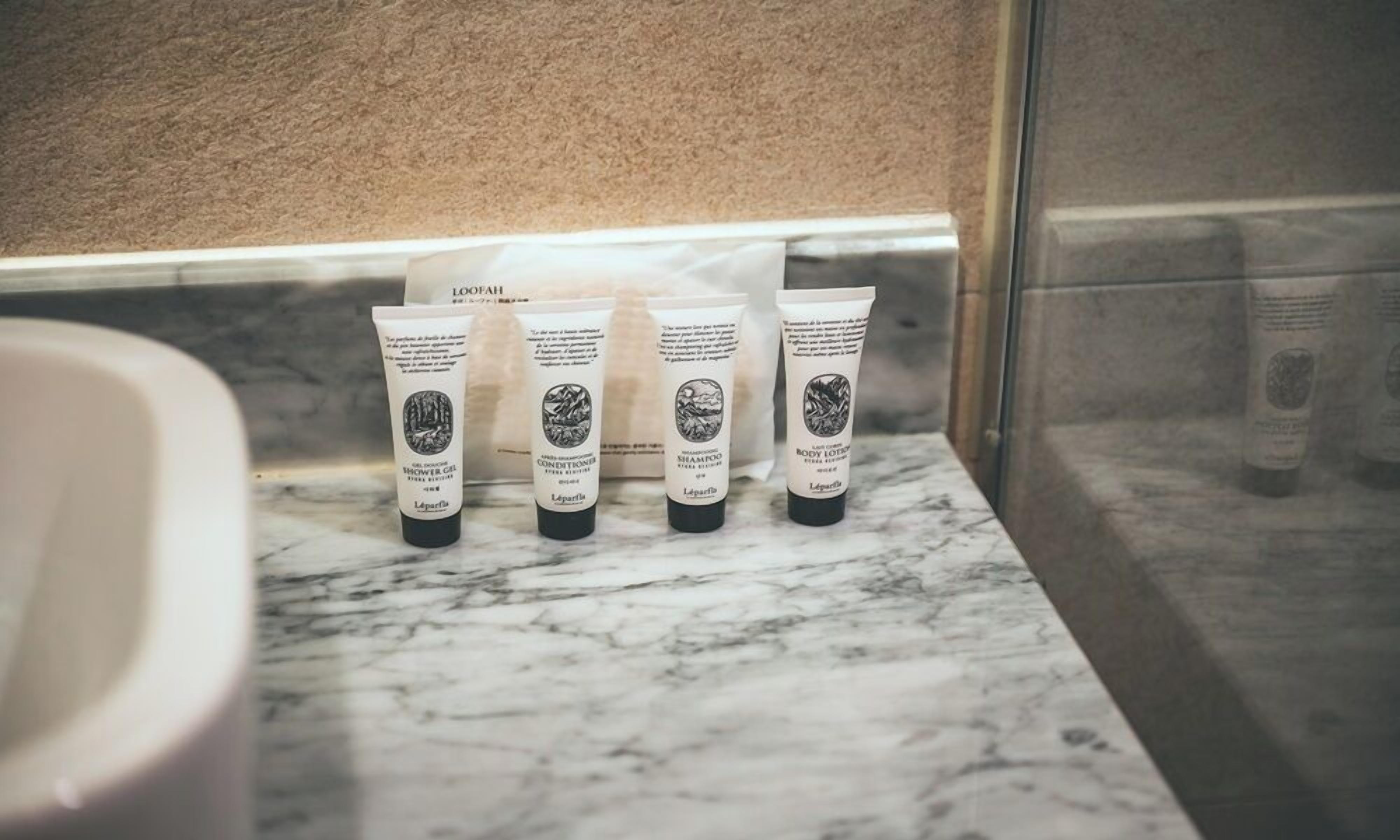 standard twin room | bathroom | shower, free toiletries, hair dryer, bathrobes