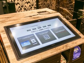 Check-in/check-out kiosk - APA Hotel Hatchobori Shintomicho (Tokyo)