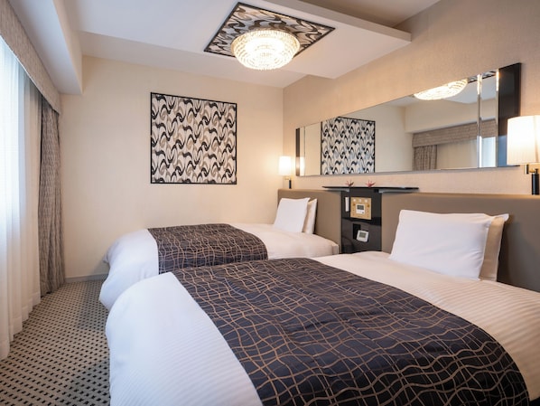 デラックス ツインルーム 2 ベッドルーム | 羽毛の掛け布団、デスク、遮光カーテン、WiFi (無料)