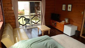 Cottage with Semi Open-air Bath | Living room | Flat-screen TV