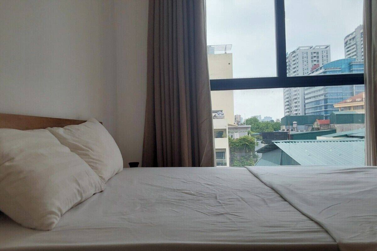 Economy Room, 1 King Bed, Non Smoking, City View | 1 bedroom, desk, soundproofing, free WiFi