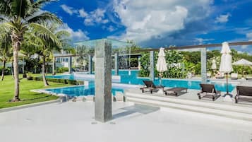 Outdoor pool, open 7 AM to 6 PM, pool umbrellas, sun loungers