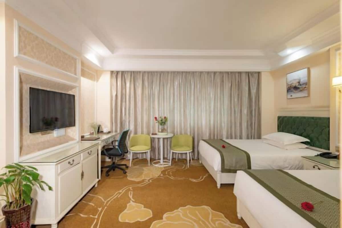 Desk, blackout curtains, rollaway beds, free WiFi