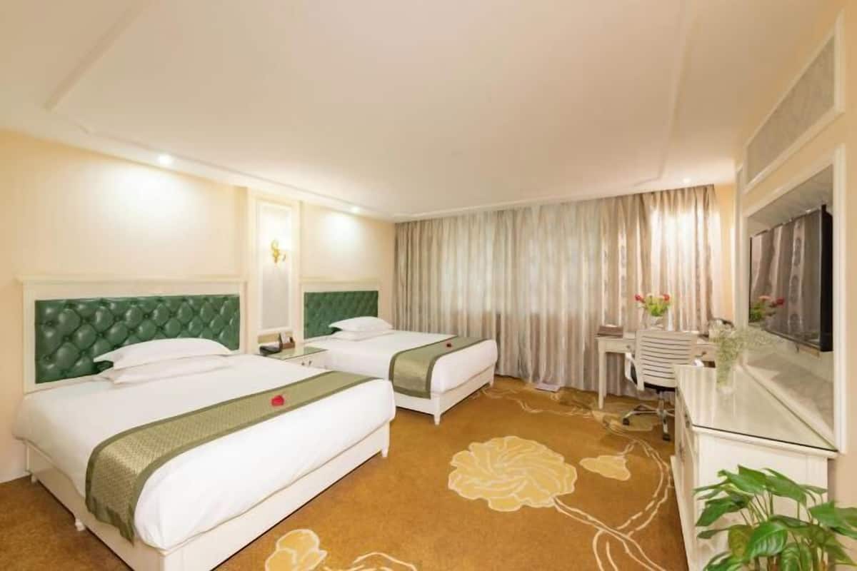 Desk, blackout curtains, rollaway beds, free WiFi