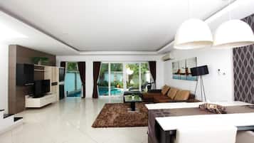 4-Bedroom Pool Villa | Living area | Flat-screen TV