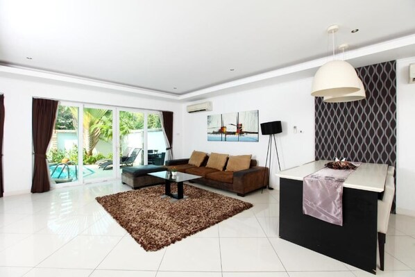 4-Bedroom Pool Villa  | Living area | Flat-screen TV