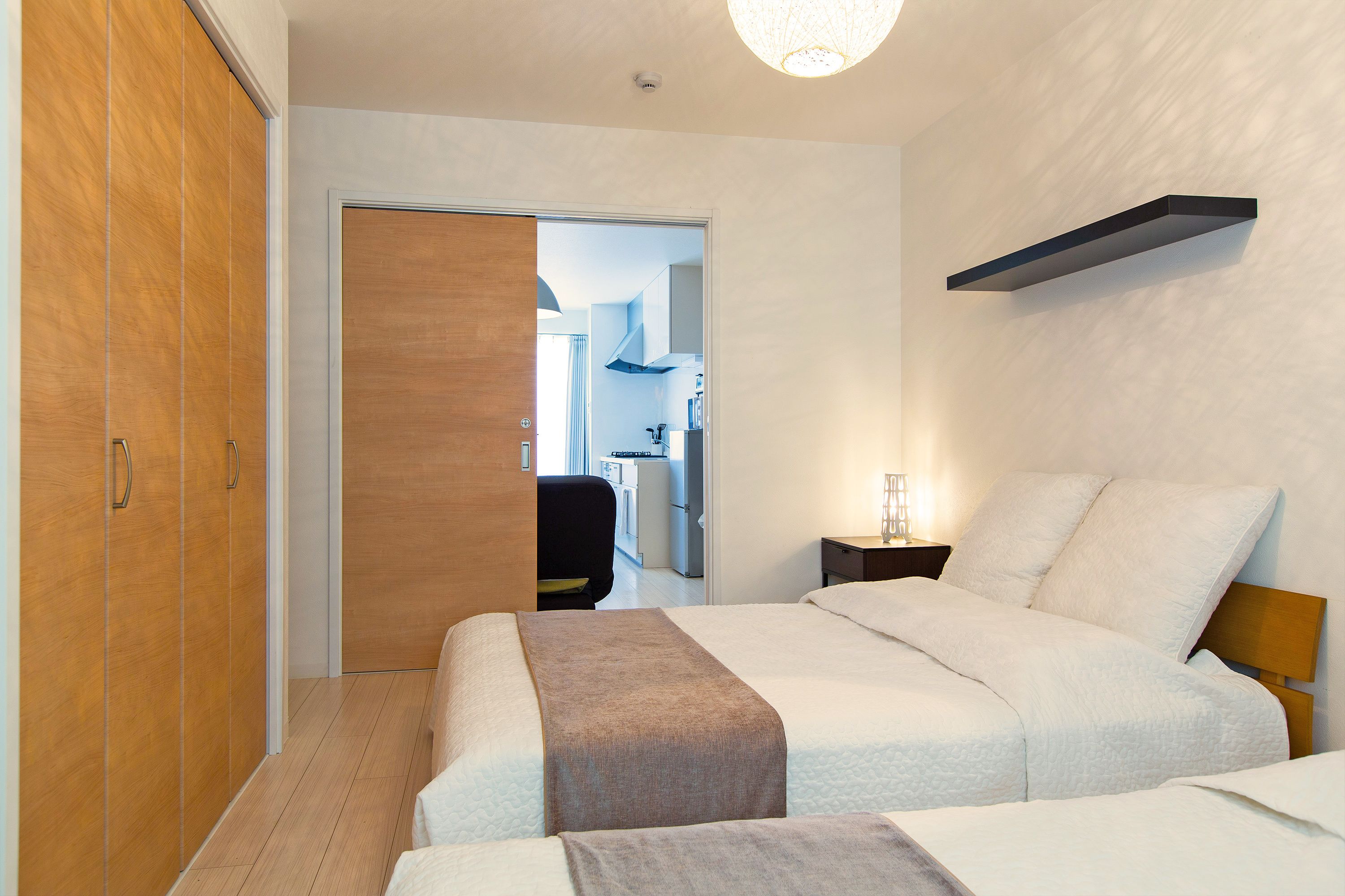 ファミリー アパートメント 2 ベッドルーム | 2 室のベッドルーム、遮光カー  テン、WiFi (無料)、ベッドシーツ