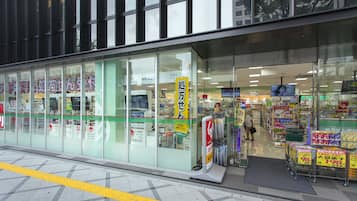 A store with large glass windows and a clear view of the interior.