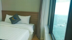 Departamento Deluxe, 2 habitaciones | 1 habitación, caja de seguridad en la habitación y escritorio