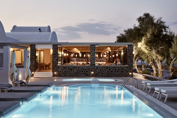 7 outdoor pools, open 8 AM to 8:00 PM, pool umbrellas, pool loungers