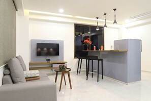 Premier Suite, 1 Bedroom, Kitchenette, City View | Living area | Flat-screen TV - Tribecca Residency (Ahmedabad)
