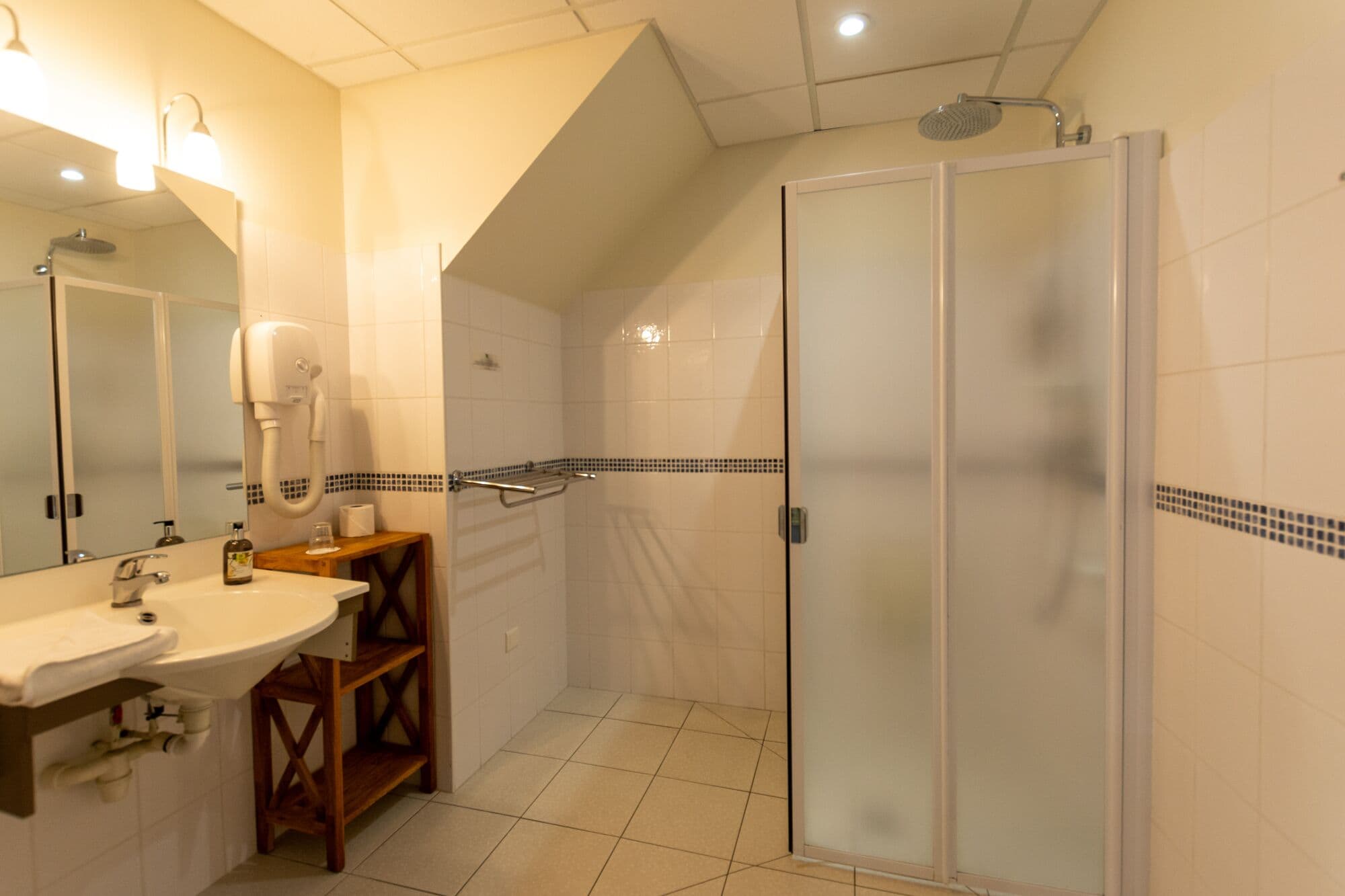 triple room | bathroom | shower, hair dryer, towels
