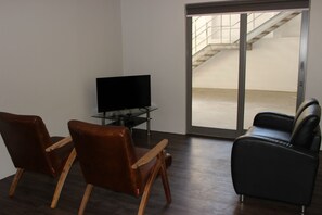 Apartemen, 1 kamar tidur | Area keluarga | TV layar datar