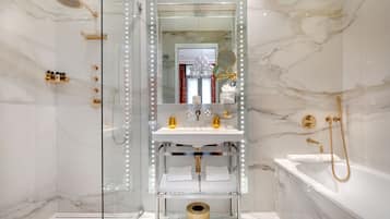 Designer toiletries, hair dryer, bathrobes, slippers