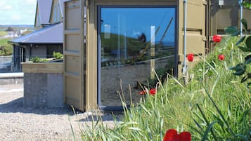 Luxury Cabin, 1 King Bed, Private Bathroom | Hypo-allergenic bedding, in-room safe, individually decorated