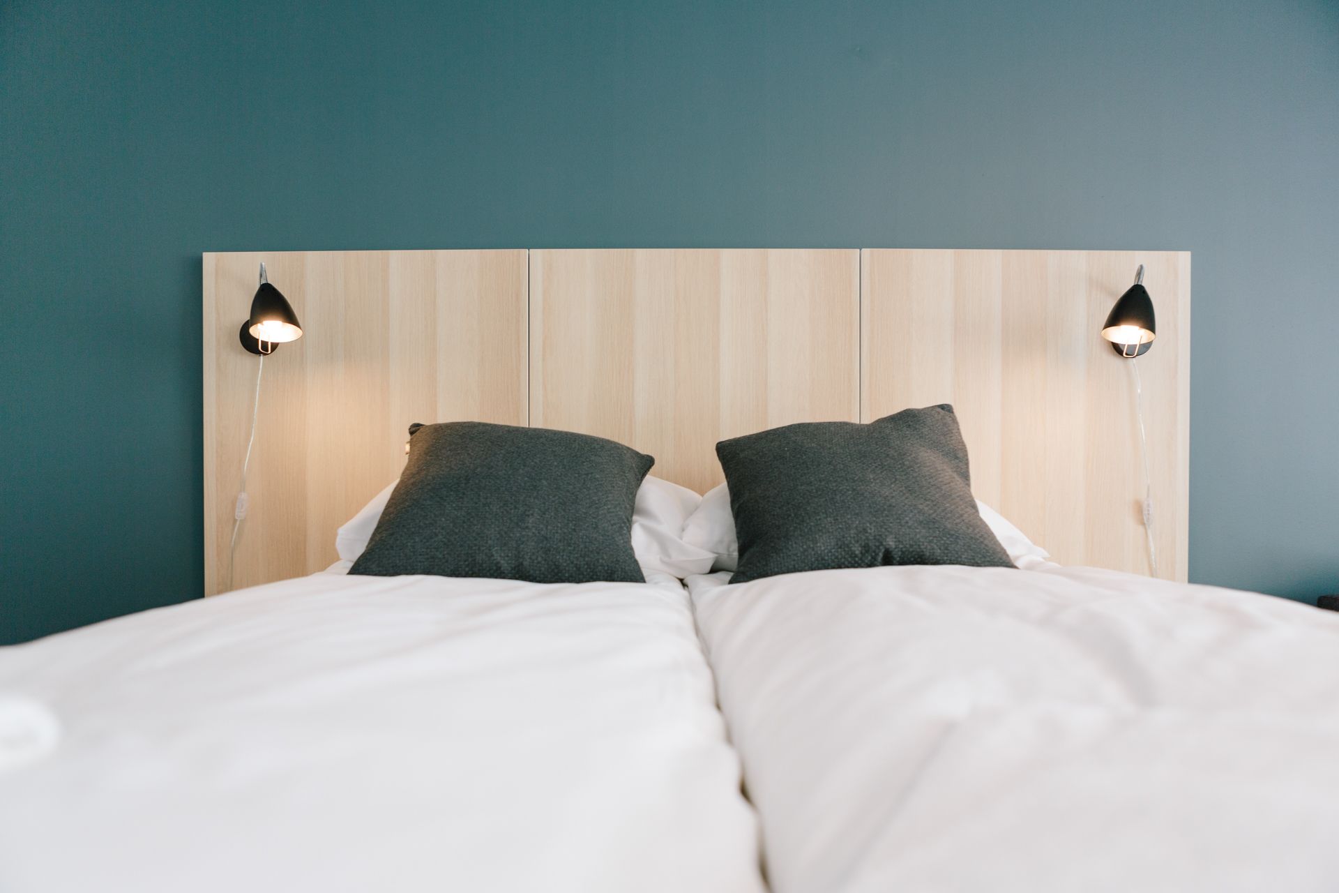 premium bedding, desk, blackout curtains, free wifi