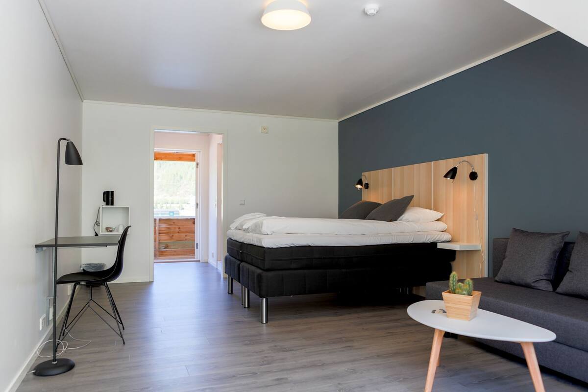 family room | premium bedding, desk, blackout curtains, free wifi