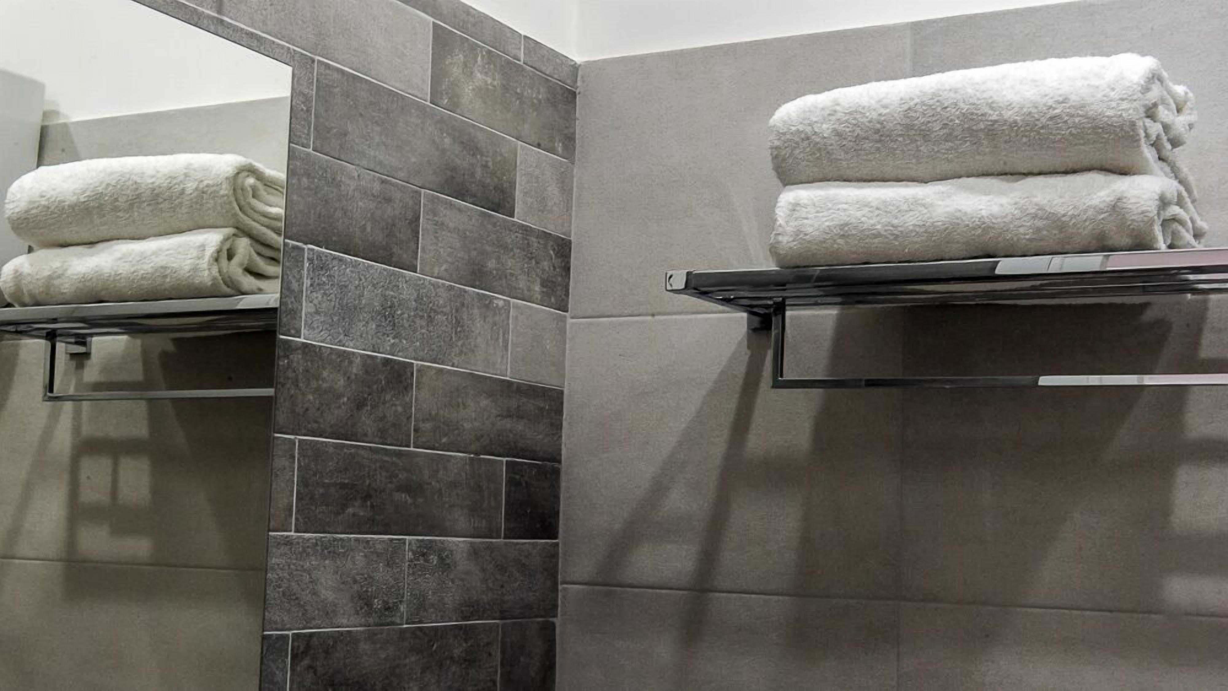Quadruple Room | Bathroom amenities | Shower, hair dryer, bidet, towels