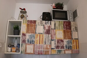 Monolocale City, 1 letto matrimoniale con divano letto | Una scrivania, postazione laptop, ferro/asse da stiro