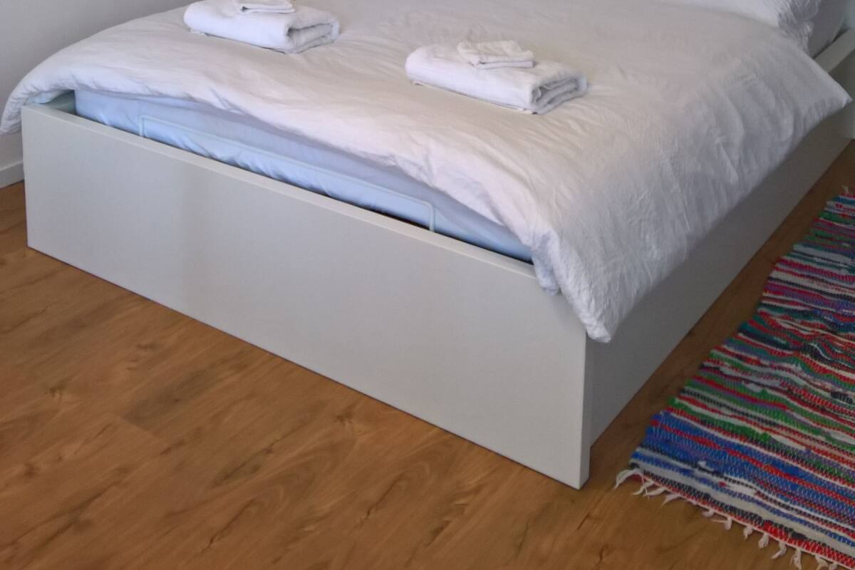 Desk, laptop workspace, iron/ironing board, cots/infant beds
