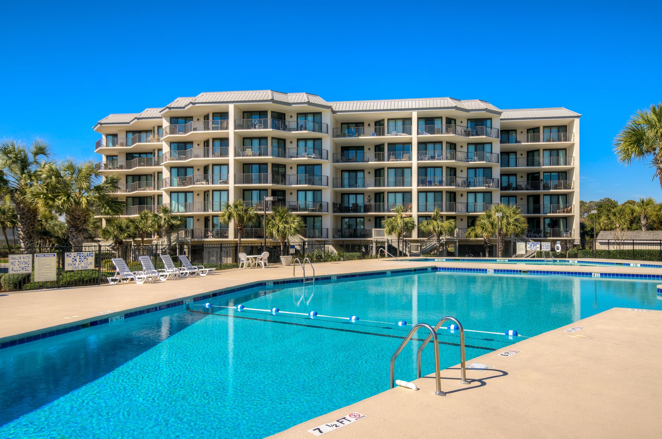 Oceanfront condo at Litchfield By the Sea with access to community pool and tennis courts.