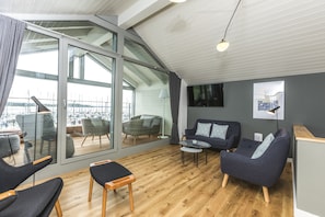 House, 2 Bedrooms, Terrace, Harbour View | Living room | Flat-screen TV - im-jaich Naturoase Rügen (Gustow)
