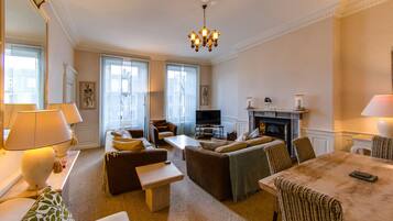 Smart TV, fireplace, DVD player, books
