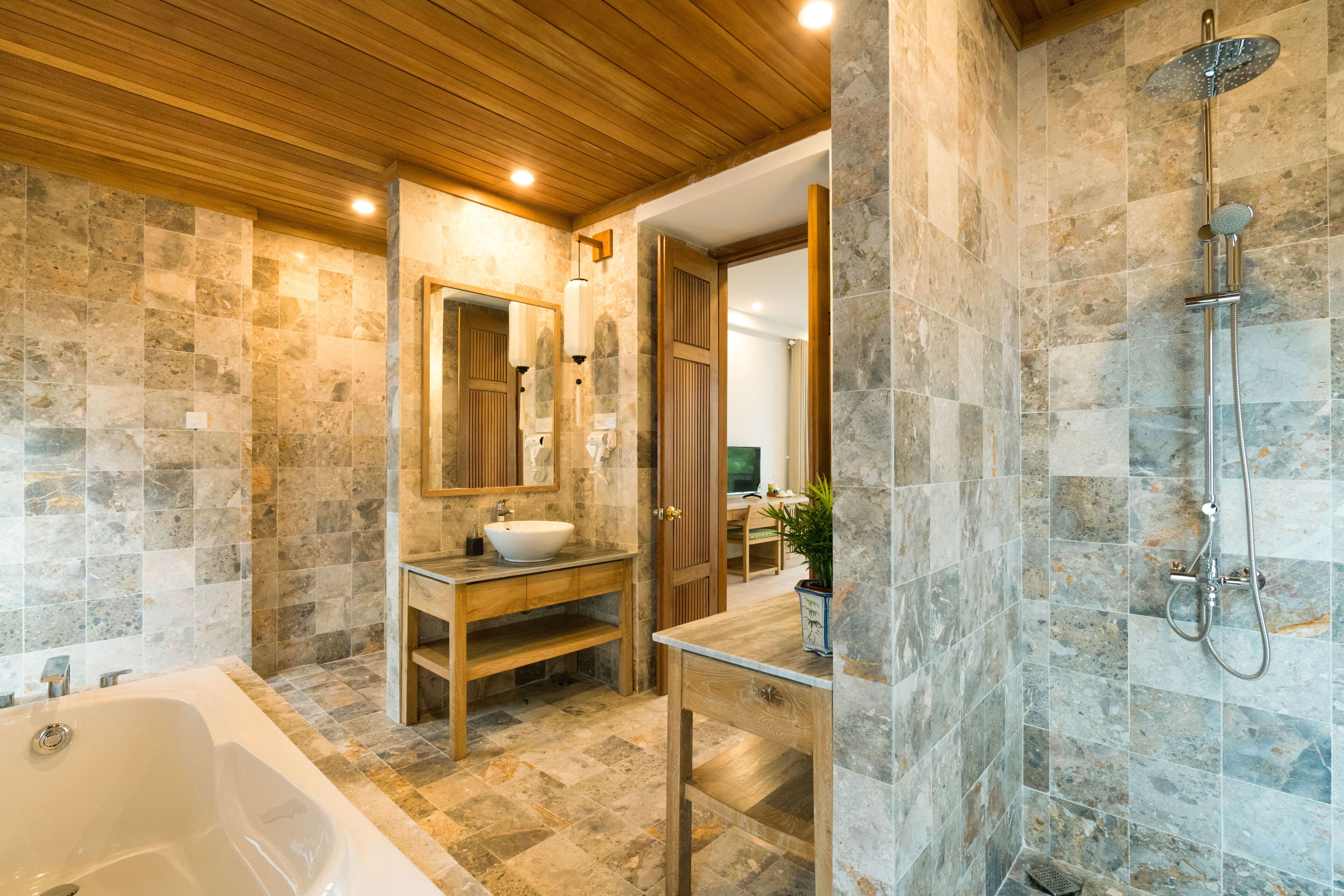 deluxe double or twin room, balcony | bathroom | eco-friendly toiletries, hair dryer, slippers, towels