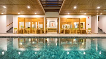 Indoor pool, open 7:00 AM to 9:00 PM, sun loungers