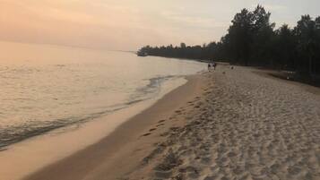 Enjoy a serene beach experience with calm waters and a tranquil atmosphere.