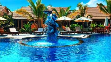 Outdoor pool, open 6:30 AM to 10 PM, pool umbrellas, sun loungers
