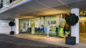 Front of property - evening/night - Point West Apartments (London)