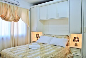 3 habitaciones, tabla de planchar con plancha, cunas y wifi gratis 