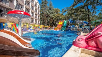 Indoor pool, seasonal outdoor pool, pool umbrellas, pool loungers