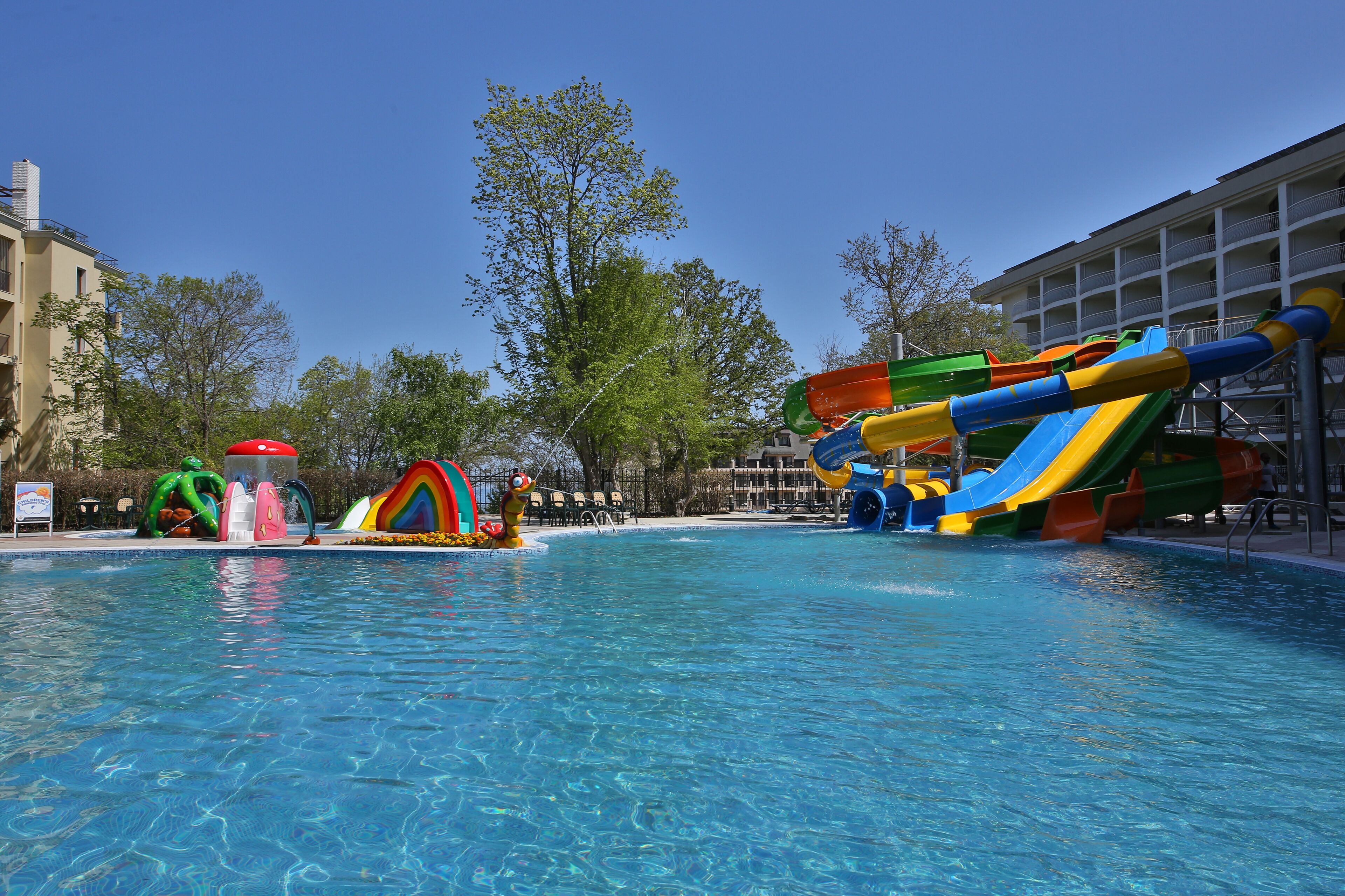 Indoor pool, seasonal outdoor pool, pool umbrellas, pool loungers